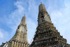 Ancient White Pagoda at Wat Arun Temple where is a Famous of Bangkok, Thailand. photo