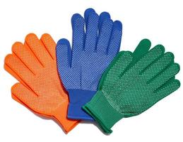 Textile work gloves on a white background. Protective clothing for manual workers, top view photo