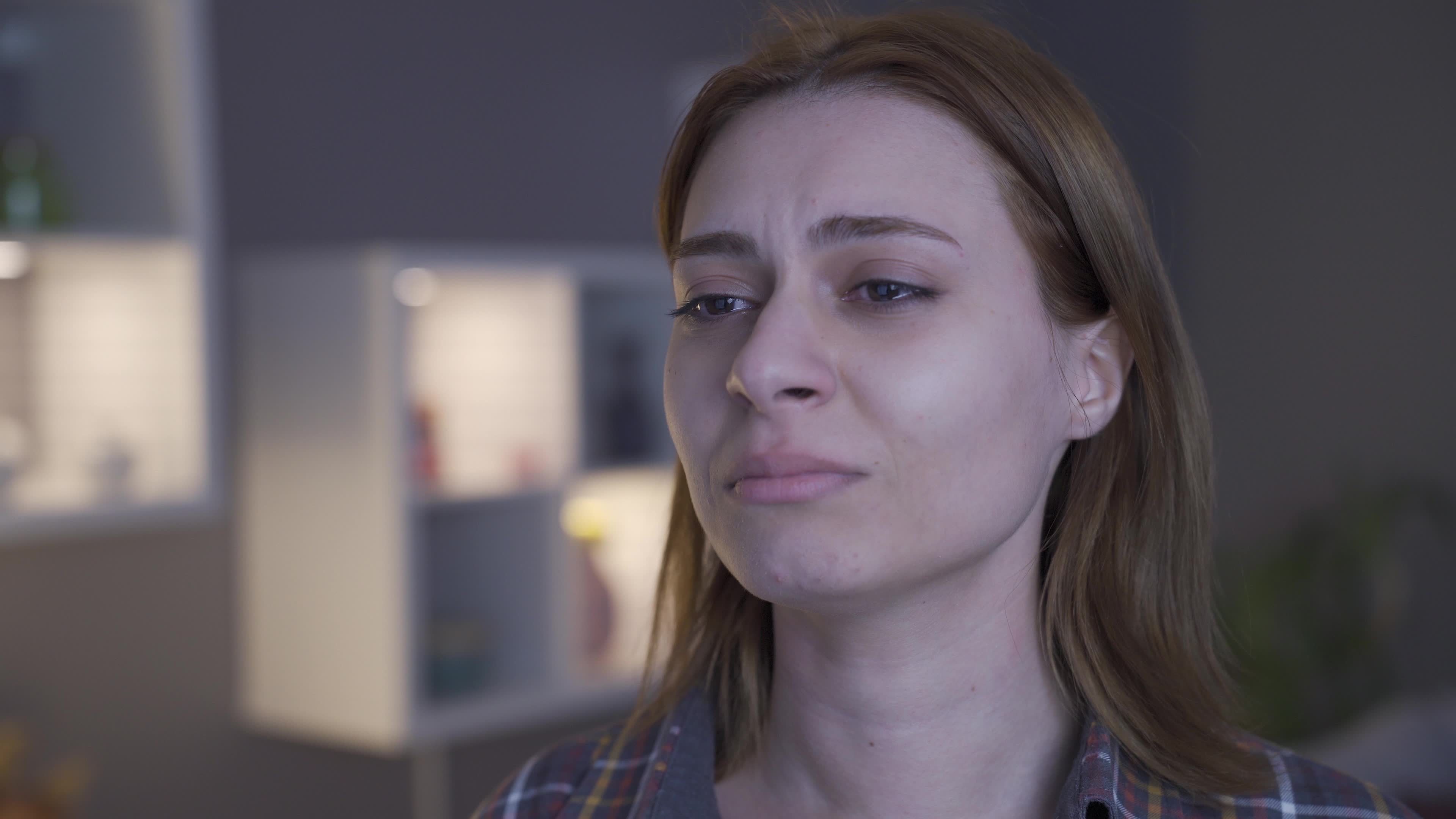 The young girl is crying and feels bad. Cry. The woman is unhappy and