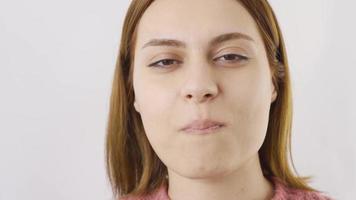 Close-up portrait of woman chewing gum. Close-up of woman chewing gum. video