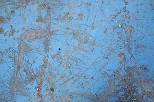 Painted Blue Cracked Floor Surface with any Scratches photo