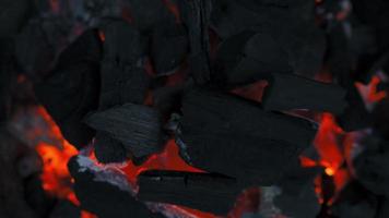 Smoldering coals for barbecue cooking as a background