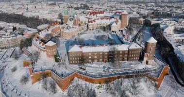 Aerial view of Wawel Royal Castle and Cathedral covered with snow, Krakow video