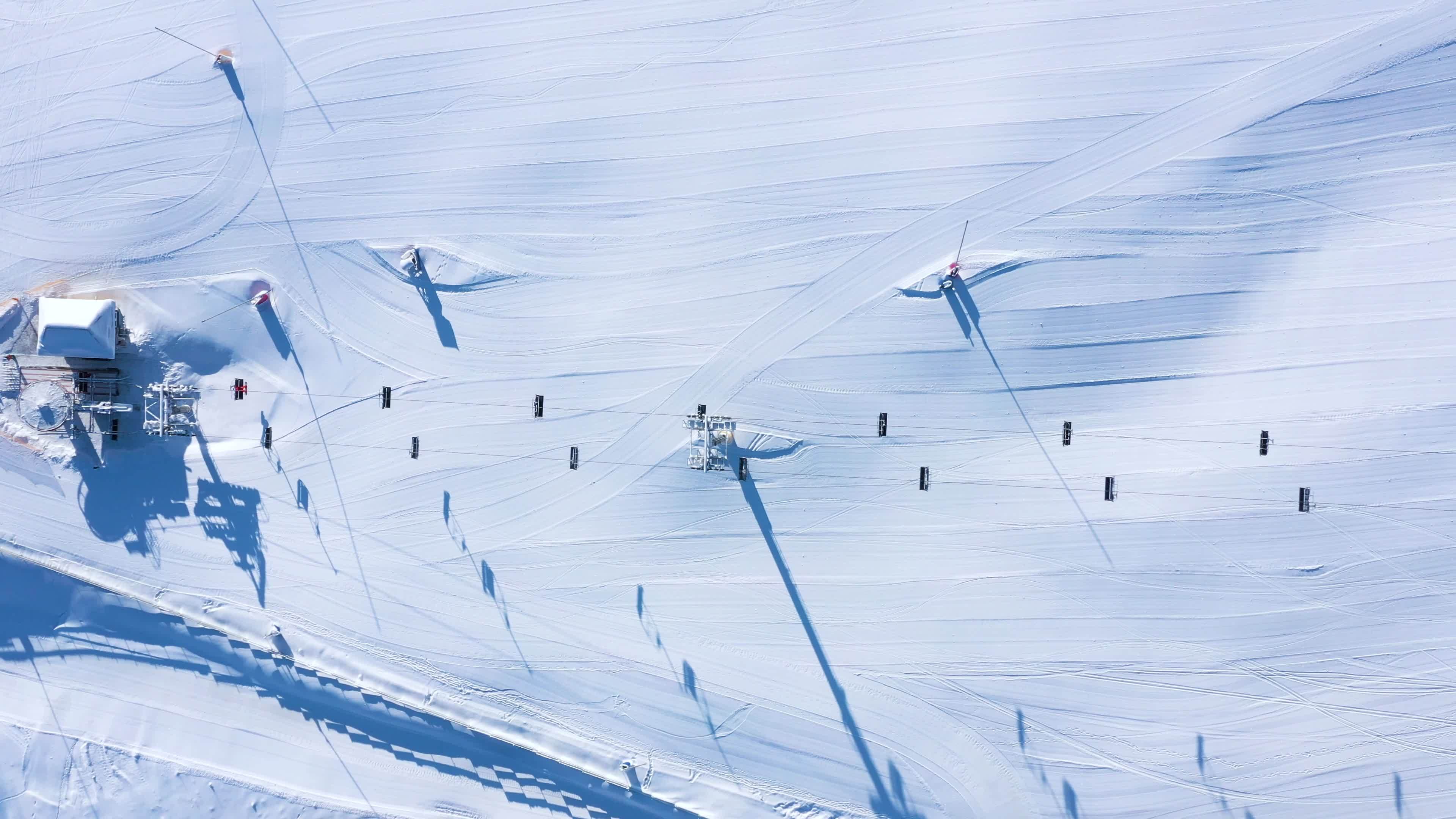 Top down view of the ski lift and the track in winter season 21569474