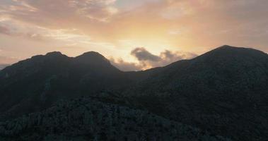 Silhouette of mountains against the background of the setting sun. Spain video