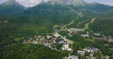 Aerial view of the Lomnitsky shield peak and resort at the foot of the mountain video