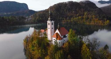 Aerial view of lake Bled and the island in the middle of it, Slovenia video