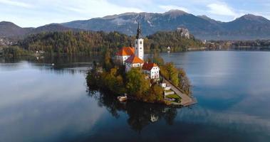 Aerial view of lake Bled and the island in the middle of it, Slovenia video