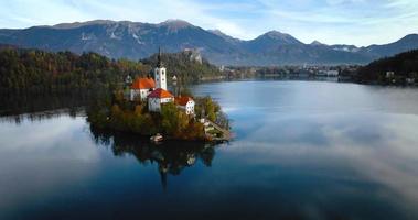 Aerial view of lake Bled and the island in the middle of it, Slovenia video