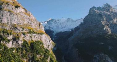 Aerial view of the beautiful Swiss nature in Grindelwald valley in Switzerland video