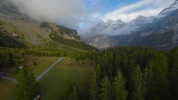 FPV maneuverable flight near the lake Oeschinensee in Swiss Alps, Switzerland. video