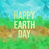 Green and orange polygonal background with the words happy earth day. vector