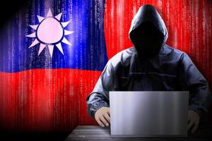 Anonymous Hooded Hacker and Flag Of Taiwan, Binary Code - Cyber Attack Concept photo