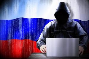Anonymous Hooded Hacker and Flag Of Russia, Binary Code - Cyber Attack Concept photo
