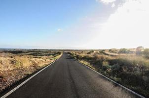 Road through the scenic landscape photo