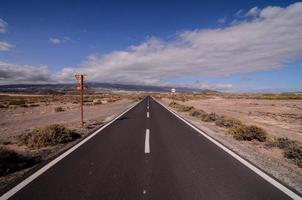 Road through the scenic landscape photo