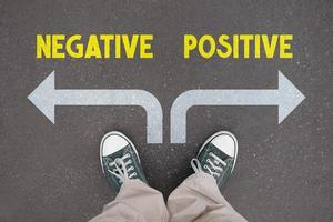 Positive, negative - legs with trainer shoes photo