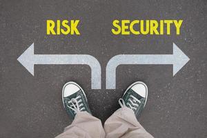 Risk and security - legs with trainer shoes photo