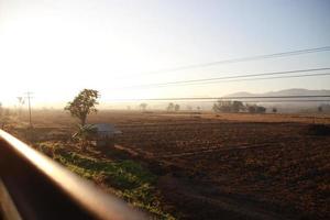 granja con Dom rayo ventana ver desde tren foto