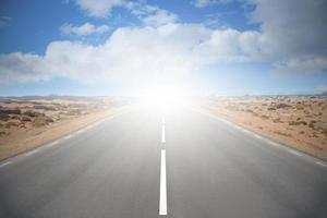 Empty Road on A Desert with Cloudy Sky photo