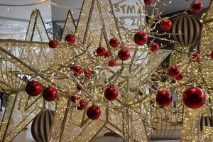 Christmas tree star decorations with red ball photo