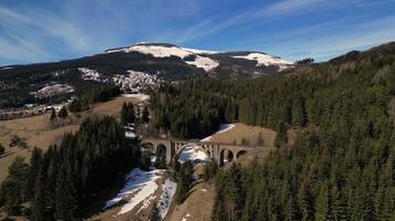 Aerial view of small railway viaduct video