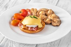 Eggs Benedict with bacon photo