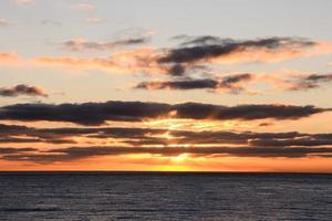 Sunset over the sea photo