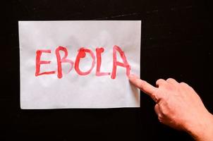 Ebola written on paper photo