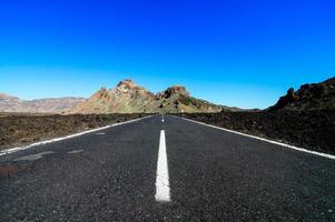 Road through the scenic landscape photo