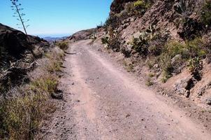 Road through the scenic landscape photo