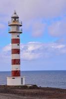 Lighthouse on the coast photo