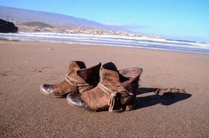 Boots on the beach photo