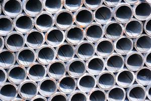 Stacked metal pipes photo