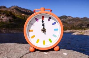 Clock on a rock photo