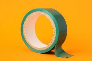 Adhesive tape on a light background photo