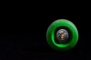 Skateboard wheels on dark background photo
