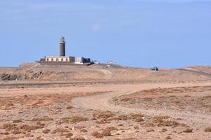 Lighthouse by the sea photo