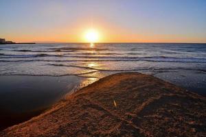 Sunset over the sea photo