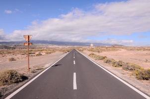 Road through the scenic landscape photo