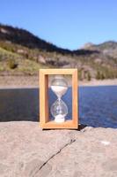 Small hourglass with sand photo