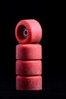 Skateboard wheels on dark background photo