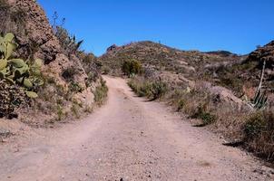 Road through the scenic landscape photo