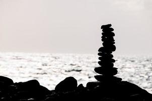 Stacked stones on the coast photo