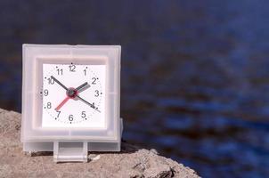 Clock on a rock photo