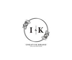 initial IK letters hand drawn feminine and floral botanical logo suitable for spa salon skin hair beauty boutique and cosmetic company. vector