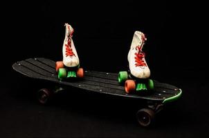 Skateboard and skates photo