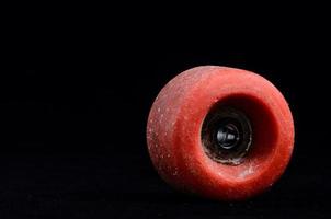 Skate wheel on dark background photo