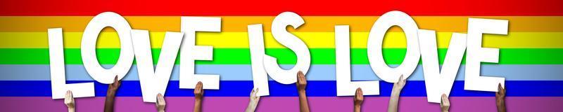 Love is Love, Lgbt Banner - Human Hands Holding Colorful Letters photo