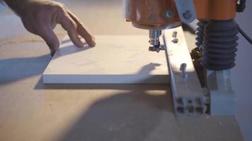 Wood drilling knives in the carpentry workshop. The carpenter uses circular blades to open the edges of the wood. video